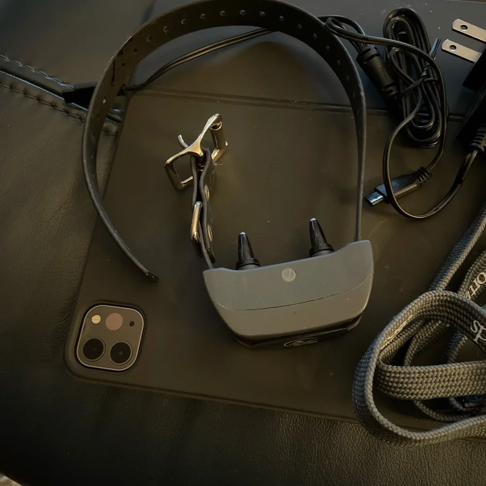 Black and Gray VR Controllers and Sensors